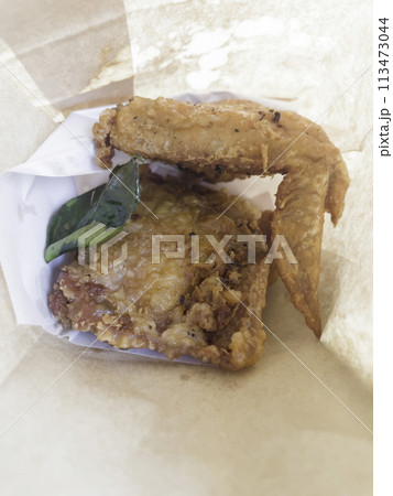 Fried chicken wings with herb Thai street food Fried chicken wings with herb Thai street food 113473044