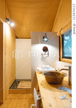 Bathroom interior in glamping. shower and toilet in the campsite. 113474117