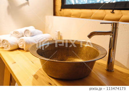 sink. Bathroom interior in glamping. shower and toilet in the campsite. 113474173