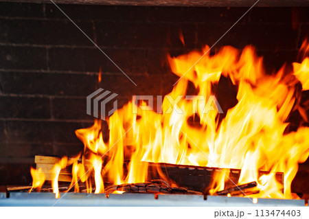 Flames of open flame in the furnace Flames of open flame in the furnace 113474403