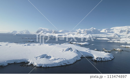Arctic Epic Ocean Mountain Landscape Aerial View. North Antarctica Open Water Coast Majestic Landscape Overview. Global Warming Nature Concept Drone Flight 113474897