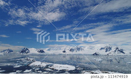 Arctic Epic Ocean Mountain Landscape Aerial View. North Antarctica Open Water Coast Majestic Landscape Overview. Global Warming Nature Concept Drone Flight 113474919