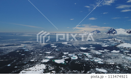 Arctic Epic Ocean Mountain Landscape Aerial View. North Antarctica Open Water Coast Majestic Landscape Overview. Global Warming Nature Concept Drone Flight Arctic Epic Ocean Mountain Landscape Aerial View. North Antarctica Open Water Coast Majestic Landscape Overview. Global Warming Nature Concept Drone Flight 113474921
