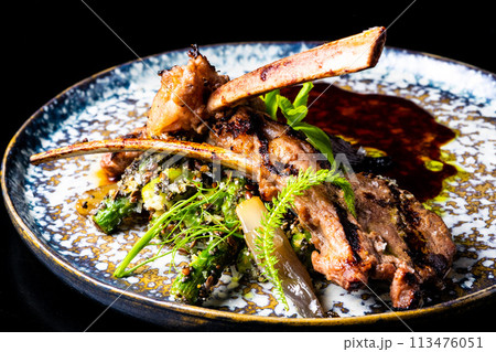 Grilled foods - rack of lamb with parsley, white radish and grocery 113476051