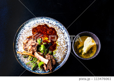 Grilled foods - rack of lamb with parsley, white radish and grocery Grilled foods - rack of lamb with parsley, white radish and grocery 113476061