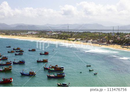 Landscape Of A Fishing Village And Traditional Fishing Boat On The Beach In Binh Dinh Province, Vietnam. 113476756