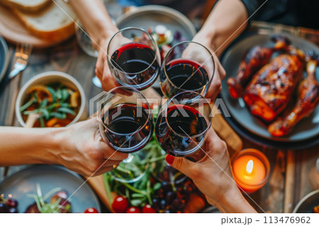 People toasting with wine glasses. Best friends celebrating at birthday party. Cheering with red wine. Generative AI People toasting with wine glasses. Best friends celebrating at birthday party. Cheering with red wine. Generative AI 113476962