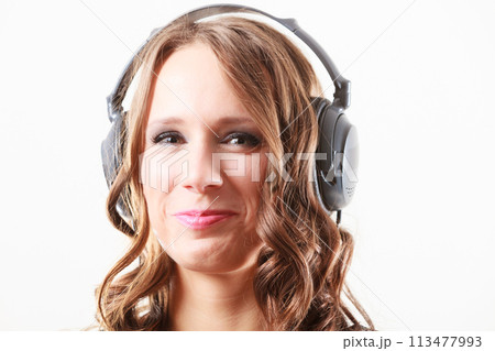 woman in headphones listening music mp3 relaxing woman in headphones listening music mp3 relaxing 113477993