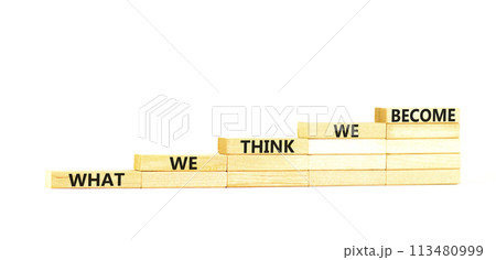 We become or think symbol. Concept word What we think We become on wooden block. Beautiful white table white background. Business we become or think concept. Copy space. 113480999