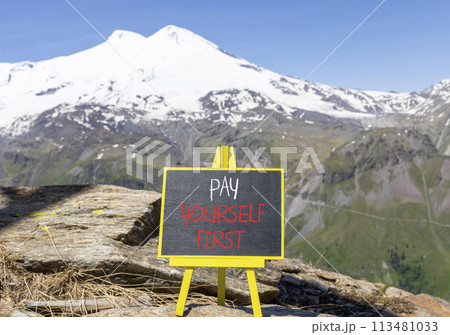Pay yourself first symbol. Concept words Pay yourself first on beautiful black chalk blackboard. Beautiful mountain Elbrus background. Business and pay yourself first concept. Copy space. Pay yourself first symbol. Concept words Pay yourself first on beautiful black chalk blackboard. Beautiful mountain Elbrus background. Business and pay yourself first concept. Copy space. 113481033