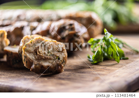 Traditional Czech Karlovy Vary dumplings on a cutting board Traditional Czech Karlovy Vary dumplings on a cutting board 113481464