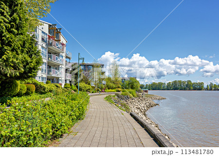 Waterfront walkway along the bank of Fraser river in New Westminster Waterfront walkway along the bank of Fraser river in New Westminster 113481780