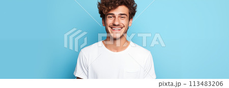Caucasian man wearing a t-shirt on a blue background. Caucasian man wearing a t-shirt on a blue background. 113483206
