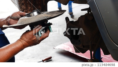 Close up Man hands fixing Car machinery vehicle mechanical service. Mechanic man hands repairing car auto repair shop. open vehicle hood checking up auto mobile. Vehicle Car maintenance engineer. Close up Man hands fixing Car machinery vehicle mechanical service. Mechanic man hands repairing car auto repair shop. open vehicle hood checking up auto mobile. Vehicle Car maintenance engineer. 113484698
