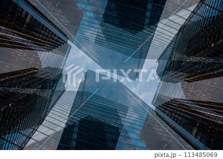 symmetry and mirrored geometry pattern, reflected skyscrapers and modern buildings abstract background, lines and tunnel futuristic technology concept symmetry and mirrored geometry pattern, reflected skyscrapers and modern buildings abstract background, lines and tunnel futuristic technology concept 113485069