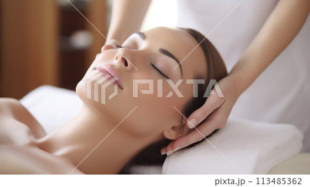 Soothing Touch: Hands Massaging Woman's Face in Bright Daytime Spa. Generative ai 113485362