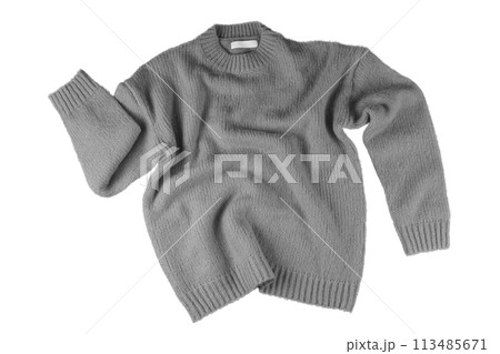 Gray flying crumpled women's autumn knitted sweater isolated on white background 113485671