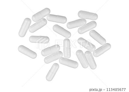 Scattered white medicine pill capsules isolated on white background 113485677