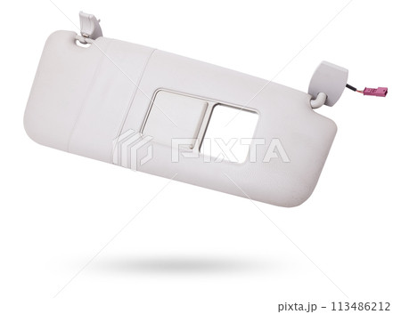 Sun visor with a mirror made of light gray plastic on a white background in a photo studio. Spare part of the car interior for replacement in a car service or for sale on auto dismantling. Sun visor with a mirror made of light gray plastic on a white background in a photo studio. Spare part of the car interior for replacement in a car service or for sale on auto dismantling. 113486212