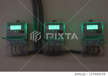 Electric billing meters and wires on board 113488259