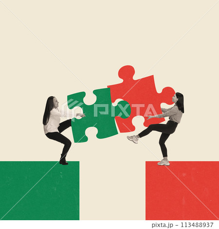 Two young women, employees pulling puzzle peace symbolizing professional competition. Conceptual creative design 113488937