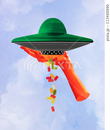 Contemporary art. collage. Hand holding green, hat like UFO dispensing array of gummy bears against cloudy sky, textured background Contemporary art. collage. Hand holding green, hat like UFO dispensing array of gummy bears against cloudy sky, textured background 113488990