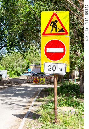 Road works sign at the city street Road works sign at the city street 113489157