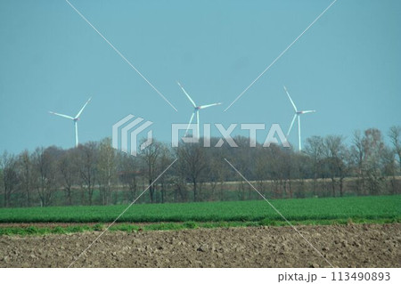 wind turbine farm in the field 113490893