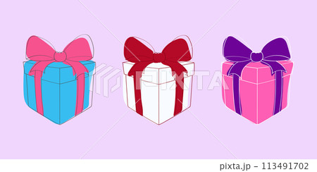 Three vibrant boxes in red, blue, and white colors, each adorned with a festive bow on top, are neatly arranged in a row 113491702