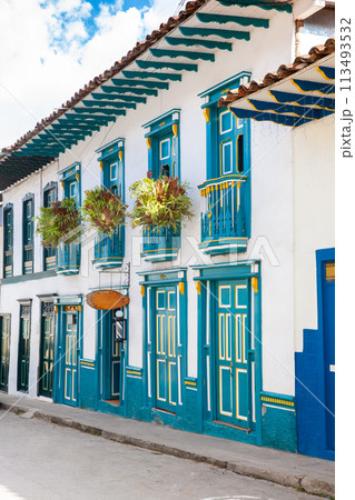 Beautiful facade of the houses at the historical downtown of the heritage town of Salamina located at the Caldas department in Colombia. 113493532