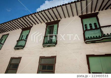 Beautiful facade of the houses at the historical downtown of the heritage town of Salamina located at the Caldas department in Colombia. 113493533