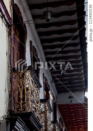 Beautiful facade of the houses at the historical downtown of the heritage town of Salamina located at the Caldas department in Colombia. 113493536
