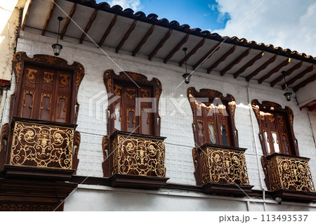 Beautiful facade of the houses at the historical downtown of the heritage town of Salamina located at the Caldas department in Colombia. 113493537
