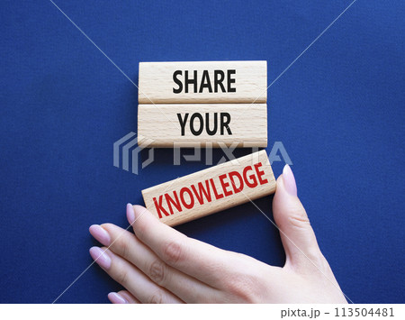 Share your knowledge symbol. Concept word Share your knowledge on wooden blocks. Businessman hand. Beautiful deep blue background. Business and Share your knowledge concept. Copy space Share your knowledge symbol. Concept word Share your knowledge on wooden blocks. Businessman hand. Beautiful deep blue background. Business and Share your knowledge concept. Copy space 113504481