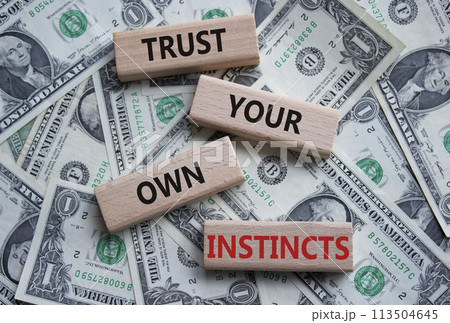 Trust your own Instincts symbol. Concept words Trust your own Instincts on wooden blocks. Beautiful dollar background. Business and Instincts concept. Copy space. Trust your own Instincts symbol. Concept words Trust your own Instincts on wooden blocks. Beautiful dollar background. Business and Instincts concept. Copy space. 113504645