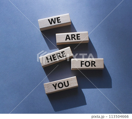 Help symbol. Wooden blocks with words We are here for you. Beautiful grey background. Business and We are here for you concept. Copy space. 113504666