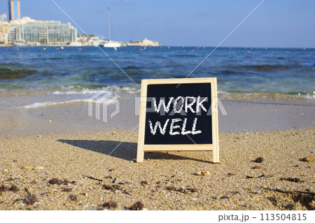 Work Well symbol. Concept words Work well on black chalk background. Beautiful sea background. Business and Work Well concept. Copy space 113504815