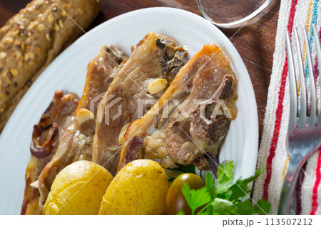 Roasted lamb ribs with potato Roasted lamb ribs with potato 113507212
