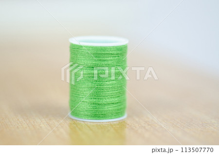 Yarn on brown table. Yarn on brown table. 113507770