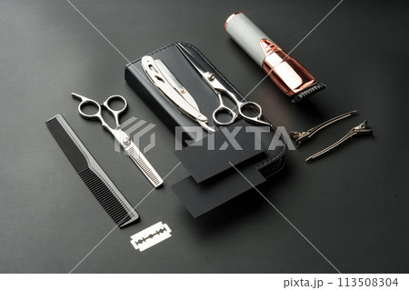 Tools for barbershop on black background studio shot Tools for barbershop on black background studio shot 113508304