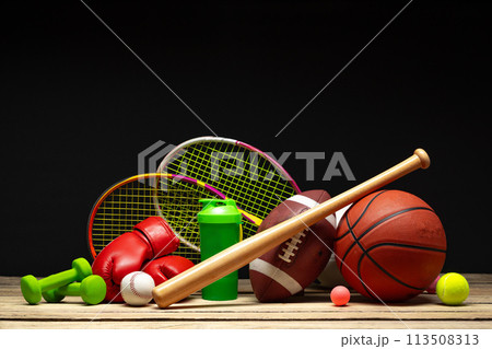 Various sports equipment on black background studio shot 113508313