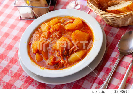 Stewed squid with potatoes 113508690