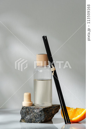 Aromatic Reed Diffuser on a Stone Base With Orange Slice Accent 113509168