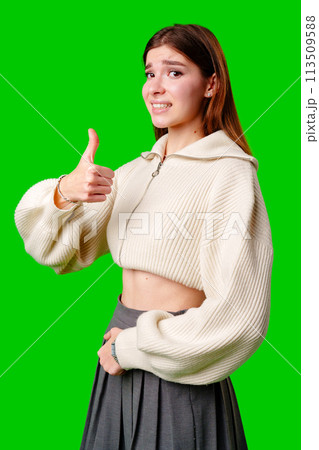 Woman in White Sweater Giving Thumbs Up 113509588