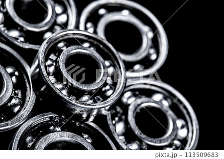 Metal gears on black background Metal gears on black background 113509683