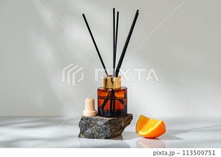 Aromatic Reed Diffuser on a Stone Base With Orange Slice Accent 113509751