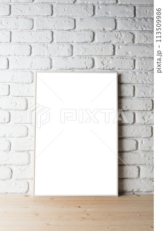 blank black picture frame on the wall 113509986