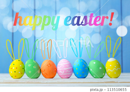 Easter eggs on wooden background Easter eggs on wooden background 113510655