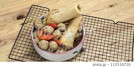 Delicious Indonesian meatballs with huge bones contains bone marrow in spicy beef broth and chilies Delicious Indonesian meatballs with huge bones contains bone marrow in spicy beef broth and chilies 113510720