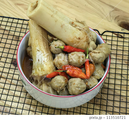 Delicious Indonesian meatballs with huge bones contains bone marrow in spicy beef broth and chilies Delicious Indonesian meatballs with huge bones contains bone marrow in spicy beef broth and chilies 113510721